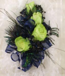 Mini jade roses with navy blue trim accented with peacock feathers