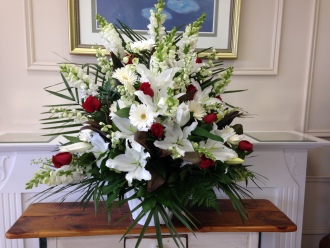 Carisma FloristsSpecial Arangement Whites and Red Roses