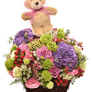 Arrangement of Cut flowers with Teddy Bear