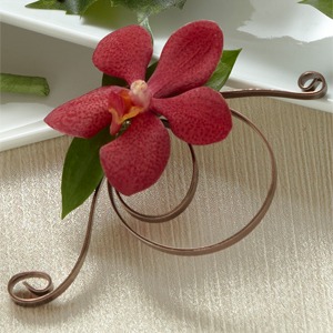 The FTD Red Mokara Boutonniere
