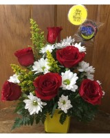 Yellow container with Roses, daisy's, and Mini Moon Pie 