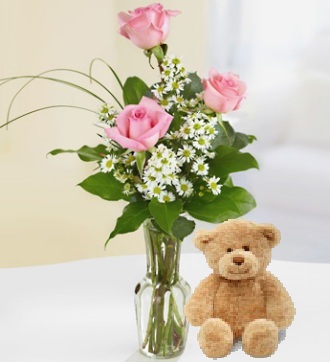 Pink Rose Bud Vase and a Teddy Bear