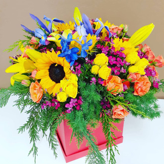 la bright spice flower box arrangement
