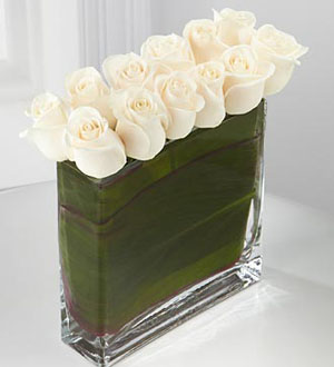 The FTD Eloquent White Rose Bouquet